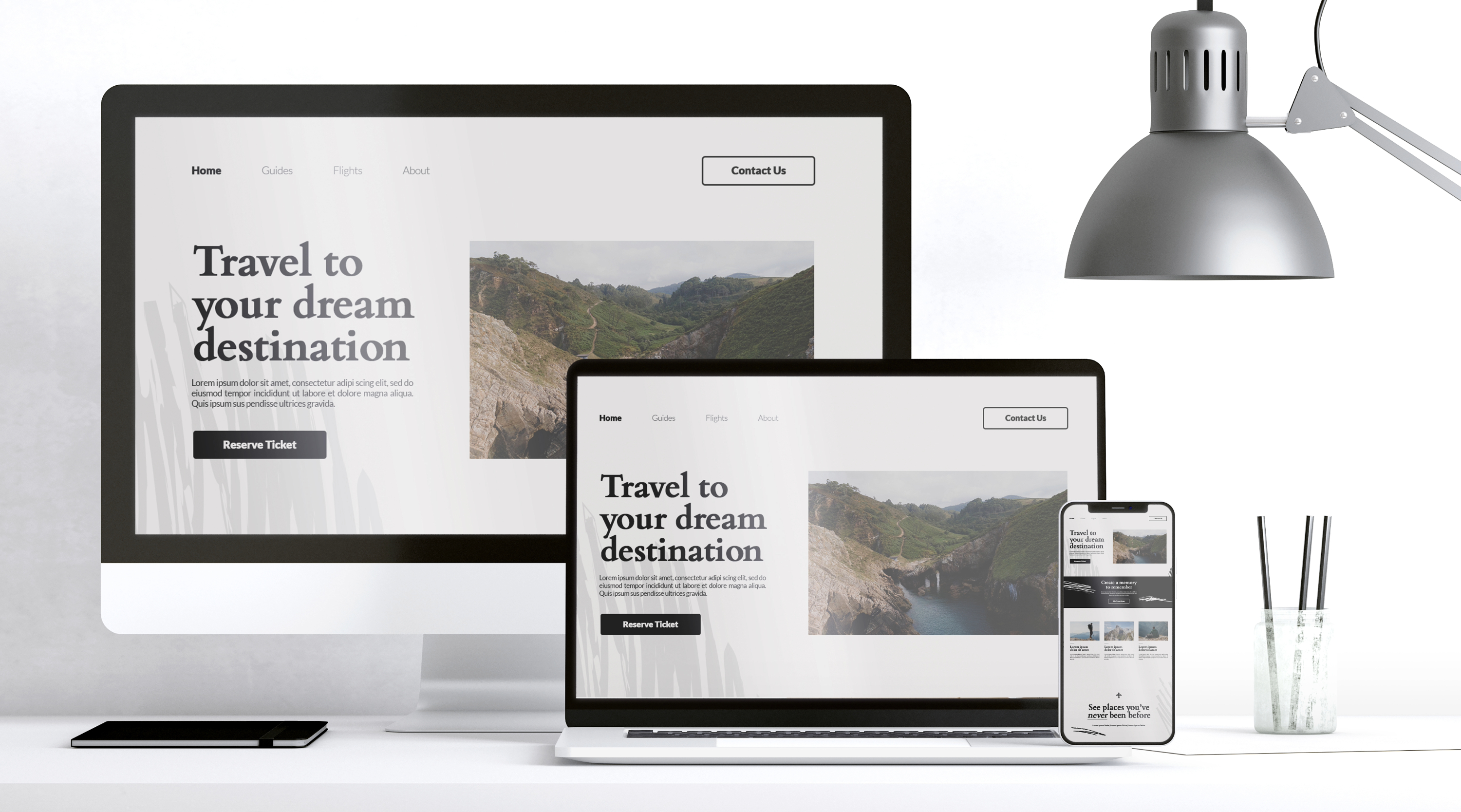 Travel website landing page on computer screens
